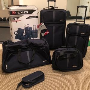 5 Piece TAG Fairfield Luggage set (never opened!)